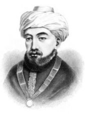 Black-and-white portrait of a bearded man with turban