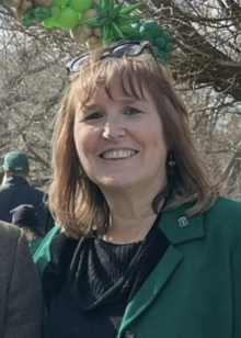 Michelle McGaw with Gabe Amo and others at 2024 Adamsville St. Patrick's Day Parade.png