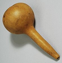 A rattle called gara is used by women in church or at dances. It is made from a particular gourd filled with okra seeds. Moru gara.jpg