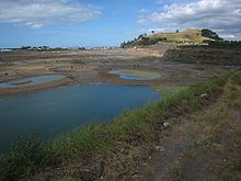 Maungarei rises beyond the Stonefields redeveloped quarry to its north