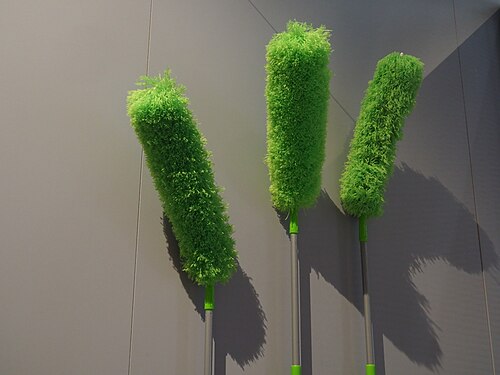 Three green microfiber feather dusters in the Design and Architecture Museum Het nieuwe Instituut, Rotterdam, Niederlande