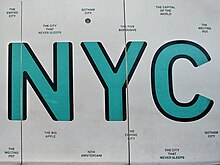 Various nicknames are featured on a wall at John F. Kennedy International Airport. NYC Nicknames Wall at JFK.jpg