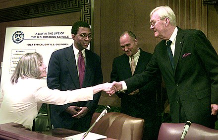 Killefer greeting Daniel Patrick Moynihan in 1999