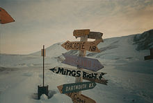 One of three signposts in Nanisivik showing directions to various cities and towns Nanisivik - SP01.jpg