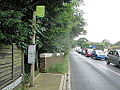 The bus stop at Butterfly Road, on Staplers Road between Newport and Wootton Bridge, Isle of Wight in June 2012. It is served by Southern Vectis buses on route 9.