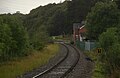 A view of the Penrhyndeudraeth level crossing, viewed from the station.