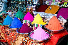 Kumkum powder displayed for sale at the market Pigments at Devaraja Market in Mysore (5992956369).jpg