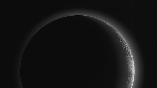 Looking back at Pluto, the largest visited KBO so far