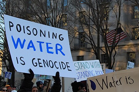 Poisoning water is genocide - Stand with Standing Rock