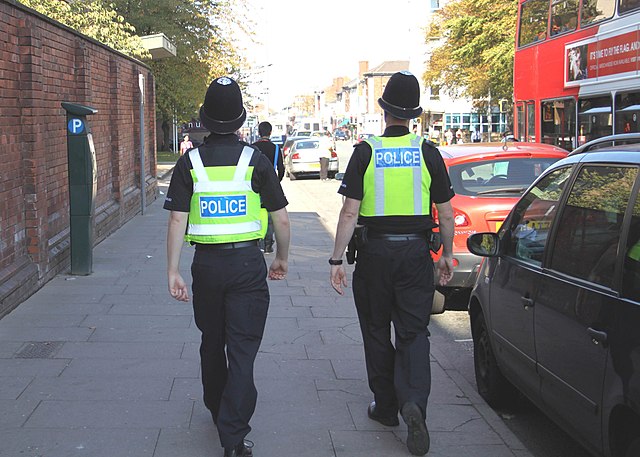 West Midlands Police officers on foot patrol in West Bromwich, England