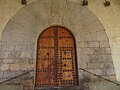 Portada de la iglesia de la Asunción en Villarroya de los Pinares (España)