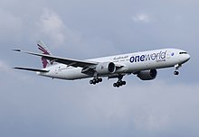 A Boeing 777-300ER of Qatar Airways in 2014 - the first among the "Big Three" carriers in the Persian Gulf to sign for any global airline alliance. Qatar Airways Boeing 777 (A7-BAF) arrives London Heathrow Airport 21September2014 arp.jpg