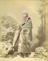 Raimund Von Stillfried - Geisha in winter costume ca. 1885 albumen.jpg