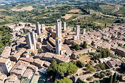 a view to Piazza del Duomo and photo of the palace with nearby Torri dei Salvucci