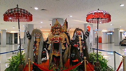 Figures of the Balinese mythology, Barong & rwo Rangdas on display at the domestic terminal.