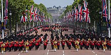 Vertical displays of the Union Flag during a parade for Elizabeth II's official birthday The Coldstream Guards Troop Their Colour MOD 45165212.jpg