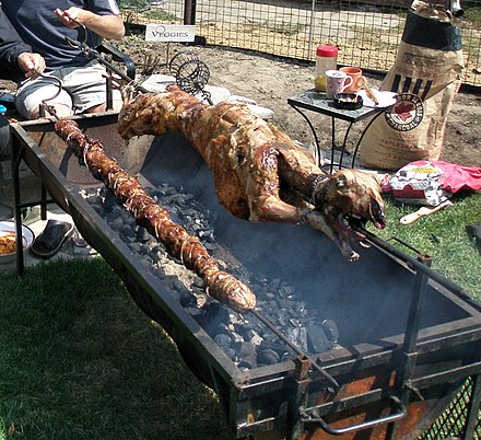 Kokoretsi being roasted with lamb during Orthodox Easter celebrations in Greece