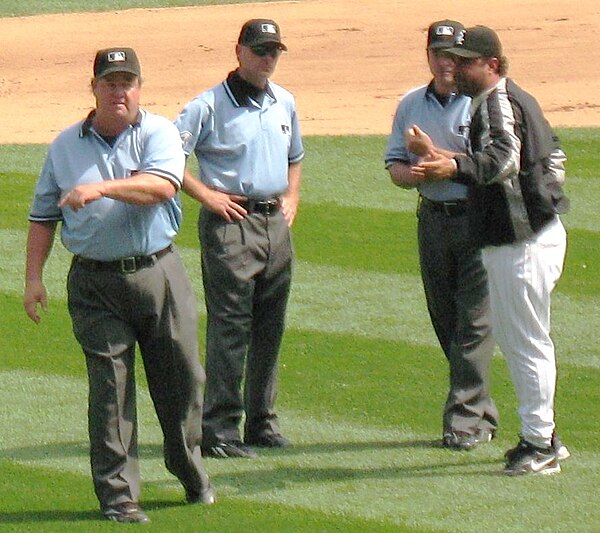 West (left) ejects Chicago White Sox manager Ozzie Guillén in 2007.