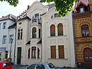 Residential house with courtyard building and paving as well as a former brewery