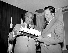 Von Braun and William R. Lucas, the first and third Marshall Space Flight Center directors, viewing a Spacelab model in 1974; von Braun's proposals for the further development of astronautics were not accepted, and priority was given to the space shuttle program instead