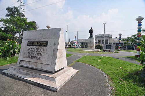 Plaza Dilao and the Paco railway station. The center of the plaza is dominated by a statue of Dom Justo Takayama, who settled here after he was exiled from Japan in 1615.