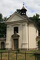 Čeština: Kaple svaté Rodiny z roku 1726 na kopci Paseka nad městysem Černá Hora, okres Blansko. Průhled ohradním plůtkem. English: Chapel of the Holy Family on top of Paseka hill in Černá Hora, Blansko District, Czech Republic.