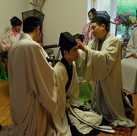 The "capping" ceremony is one of the principle rites of the Confucian ritual religion, alongside marriage, mourning rites, and sacrificial rituals