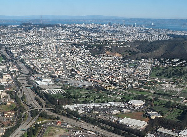 Aerial view of Colma, facing north; 280 Metro Center is in the lower center, adjacent to Woodlawn (to the north) and Greenlawn (to the east)