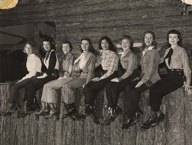 File:8 female students of the University of Houston, wearing historical western garb for "Frontier Fiesta" (1950s).jpg