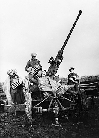 A Bofors gun deployed in France. A 40mm Bofors anti-aircraft gun and crew near Douai, France, November 1939. O327.jpg