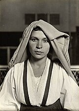 Lewis Wickes Hine. Woman with Folded Headdress, Ellis Island, NY, 1905