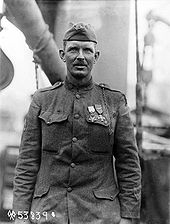 Sergeant Alvin York at his press conference held on board USS Ohioan upon arrival in New York, 22 May 1919 Alvin York on USS Ohioan.jpg