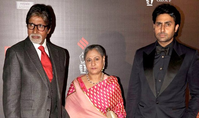 Bachchan with his parents Amitabh and Jaya Bachchan in February 2014