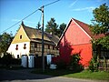 Residential stable house, barn and gate system of a three-sided courtyard