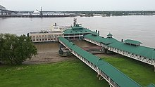 The casino boat, with enclosed walkways leading to it Belle of Baton Rouge boat.jpg