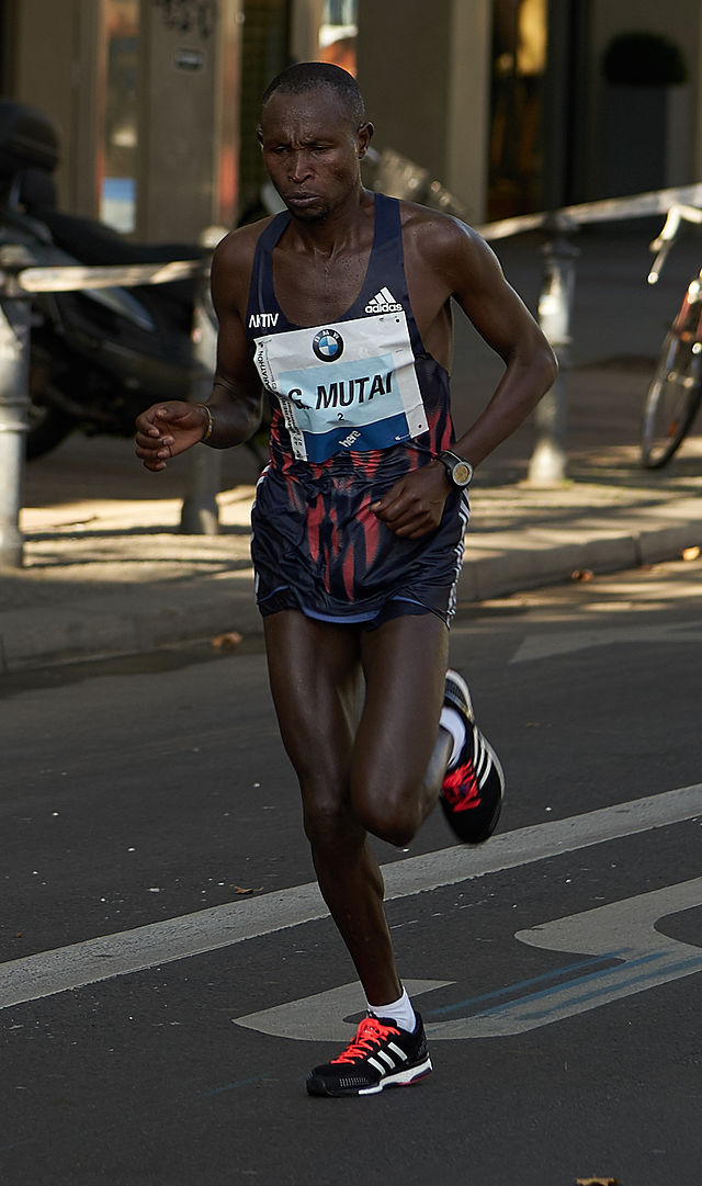 A photo of Geoffrey Mutai running in a road race