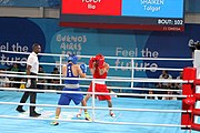 Deutsch: Boxen bei den Olympischen Jugendspielen 2018 Tag 12, 18. Oktober 2018 - Finale im Leichten Weltergewicht Jungen – Ilia Popov (Russland, rot) schlägt Talgat Shaiken (Kasachstan, blau) 4-1; Ringrichter ist James Beckles (Trinidad und Tobago). English: Boxing at the 2018 Summer Youth Olympics on 18 October 2018 – Final Light Welterweight Boys Bout - Ilia Popov (Rusia, rojo) supera a Talgat Shaiken (Kazajstán, azul) 4-1; Referee is James Beckles (Trinidad and Tobago). Español: Boxeo en los Juegos Olímpicos Juveniles de Verano de 2018 en 18 de octubre de 2018 - Chicos de peso welter ligero final: Ilia Popov (Uzbekistán, roja) le gana a Talgat Shaiken (Egipto, azul) 4-1; El árbitro es James Beckles (Trinidad y Tobago).