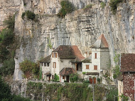 Troglodyte houses built into the cliff in Lot