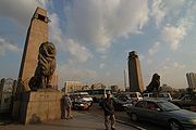 View of eastern bridge end with obelisks and lions, circa 2000s.