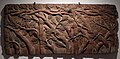 Carved wooden panel decorated with oak and beech trees. 1600-1650. Ashridge Park, Hertfordshire. Originally part of a larger carving, this piece was cut and reused as a door during the 19th century. AN1959.167.