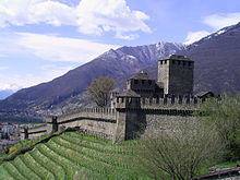Montebello castle located on a rocky hilltop east of town is connected to Castelgrande by the city walls ChateauMontebelloBellinzona.jpg