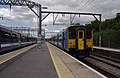 2012-06-19 15:21 Greater Anglia 315824 and 317664 stand at Chingford.