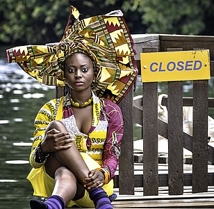Lady in Gele, an african head dress in Ghana by Dili Osuhor