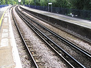 Third rail electrification in Kent. Trains use a contact shoe system to collect electricity from the 750 V DC third rail. Cwr at whitstable.jpg