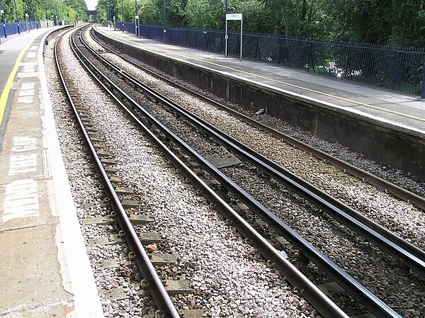 Third rail electrification in Kent. Trains use a contact shoe system to collect electricity from the 750 V DC third rail.