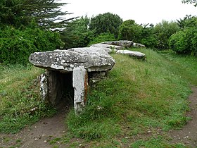 "Two huge standing stones" like a doorway: A long barrow, the dolmen at Locmariaquer, Brittany. The chamber is a passage with wider places for burials and grave-goods. Dolmen du Mane Rethual-Locmariaquer (4).jpg