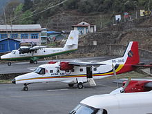 An Agni Air Dornier 228 in front of a Twin Otter of Tara Air in Lukla Airport, Nepal Dornier Do 228-101 (9N-AHE).jpg