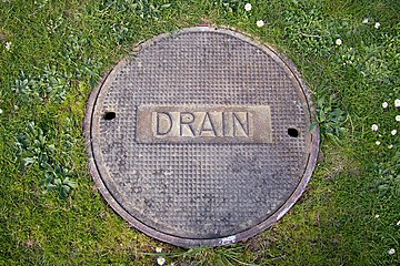 Drain manhole cover in Seattle, WA