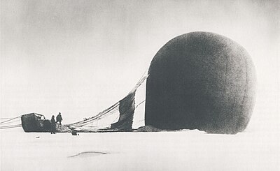 S. A. Andrée and Knut Frænkel with the balloon on the pack ice, photographed by the third expedition member, Nils Strindberg. The exposed film for this photograph and others from the failed 1897 expedition was recovered in 1930.