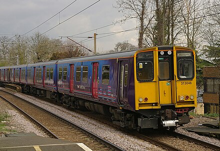 First Capital Connect units 313046 and 313030 at Enfield Chase. 313s often operated in pairs on Hertford Loop services.